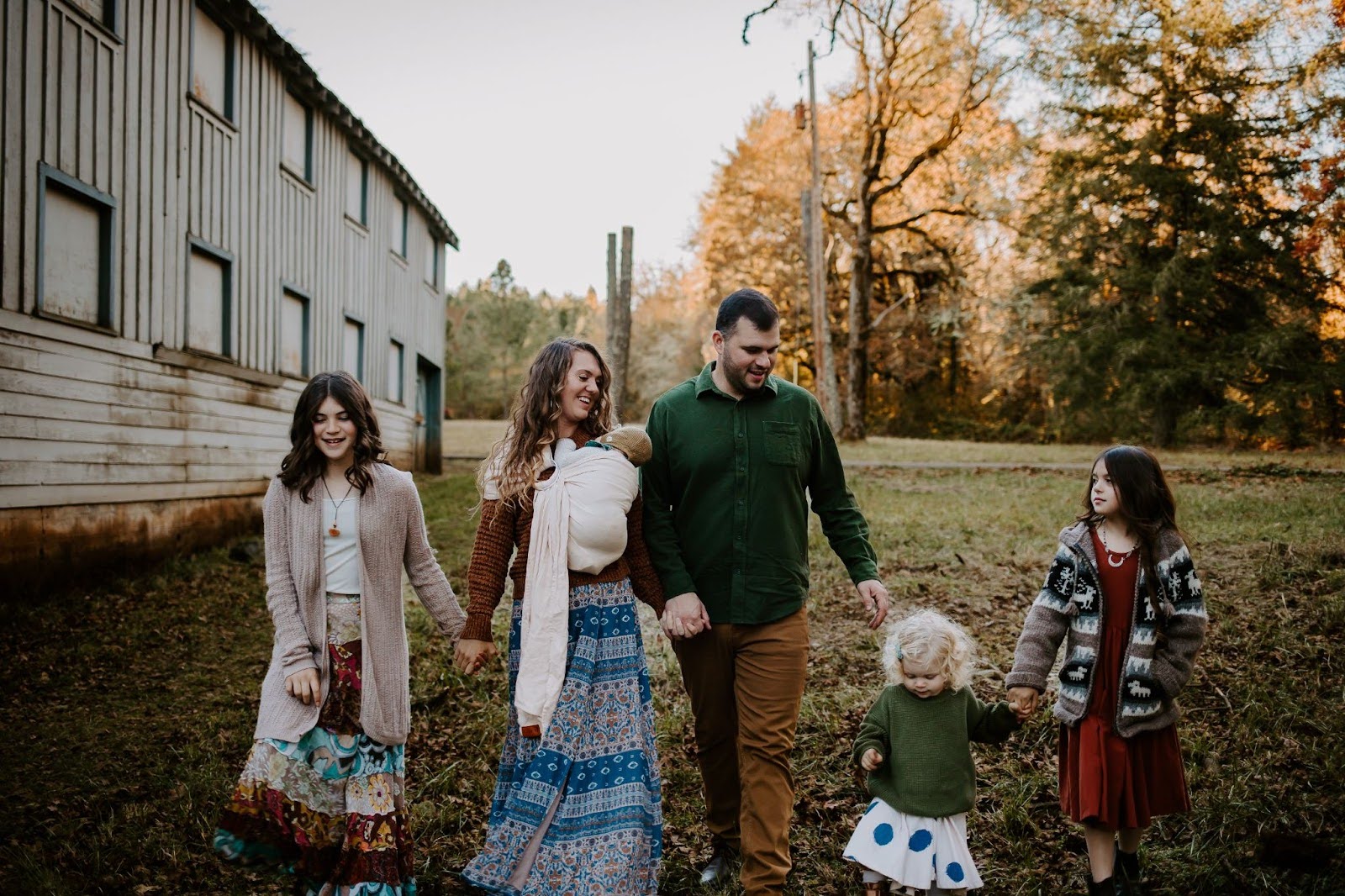 Mrs. Robles with her husband, three daughters, and one son
